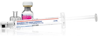 vial of NovoSeven&reg; RT and syringe of histidine for reconstitution